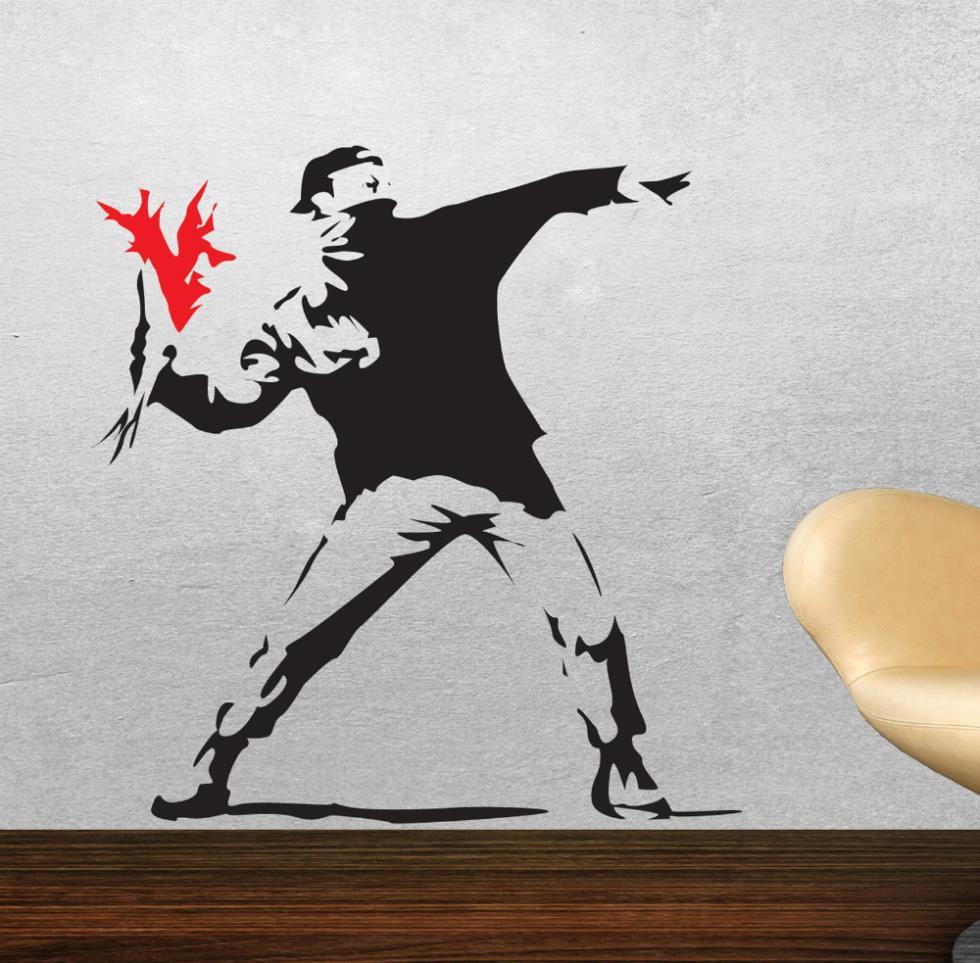 Sticker mural - Bansky "HOOLIGAN THROWING FLOWERS RIOT" | sticker mural | STIKEO.COM